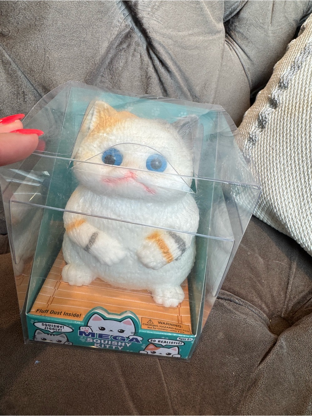 White and Orange Mega Squishy Kitty in Box with fur dust